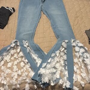 Elegant Blue Flare Jeans with Floral Accents